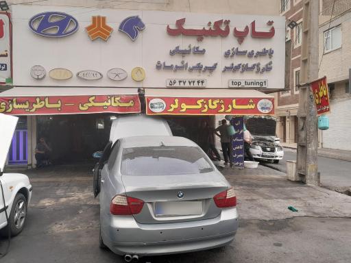 عکس خدمات برق اتومبیل تاپ تکنیک