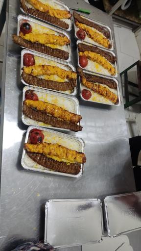 عکس تهیه غذای پدر خوب