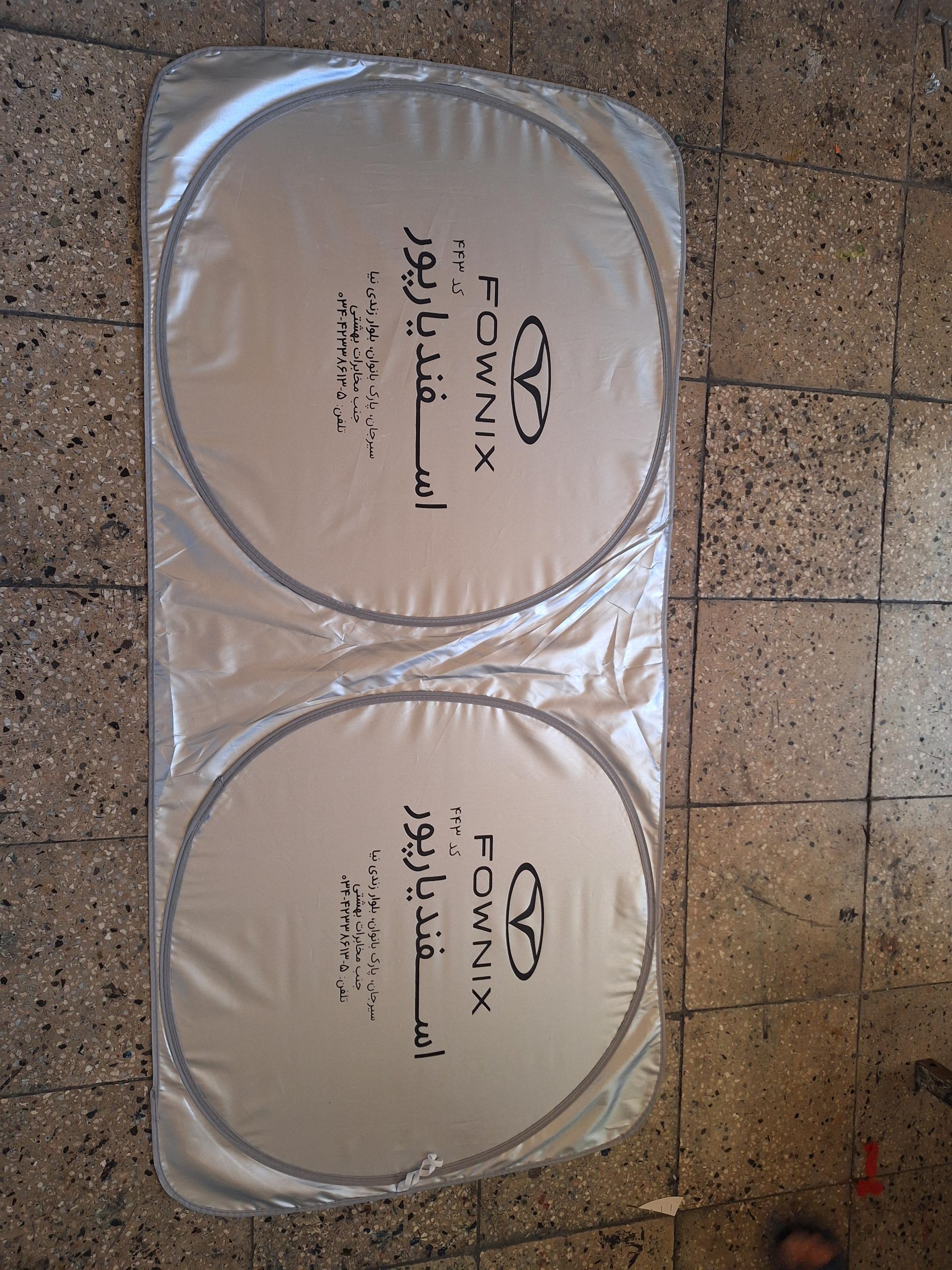 عکس تولیدی آفتابگیر تبلیغاتی ماشین