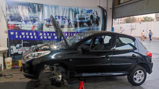 عکس تعمیرگاه مرکزی پژو 206