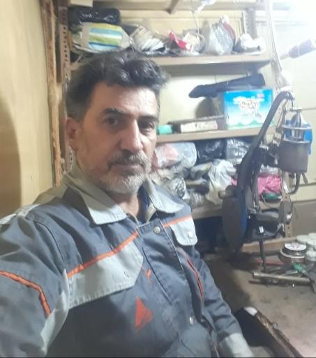 عکس تعمیرات کفش و کیف استاد یحیی