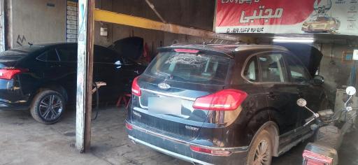 عکس تعمیرگاه چینی مجتبی