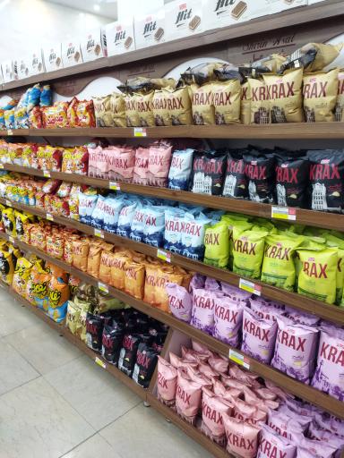 عکس فروشگاه زنجیره ای شیرین عسل 