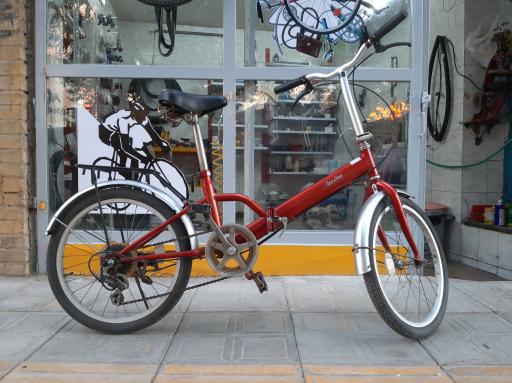 عکس تعمیرگاه دوچرخه حکمت