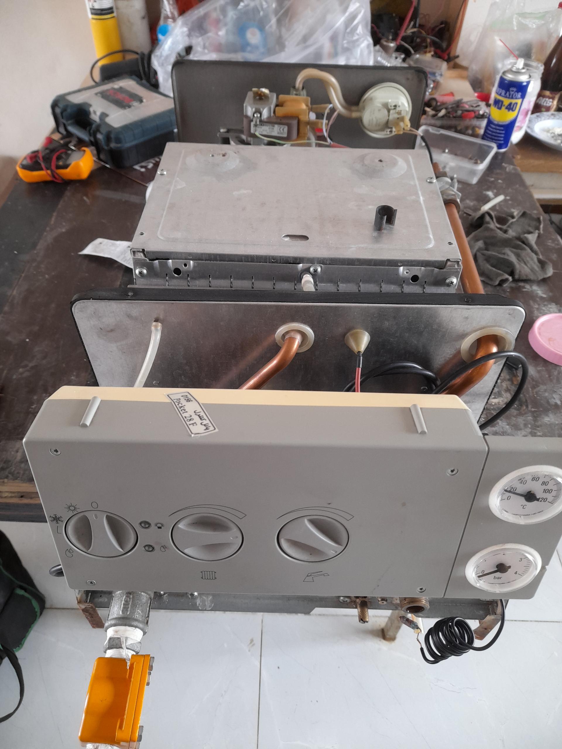 عکس تعمیرات پکیج و آبگرمکن آرامش