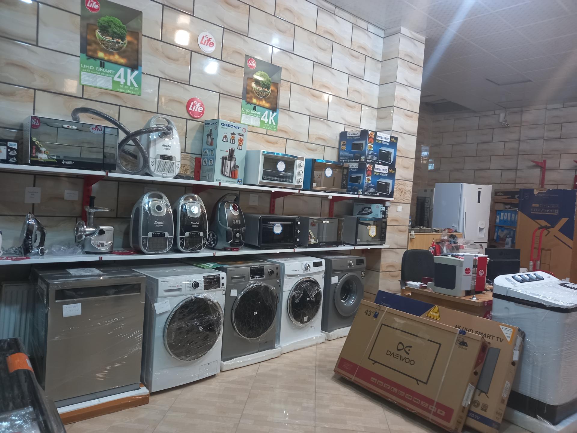 عکس تعمیرگاه و فروشگاه لوازم خانگی باقری