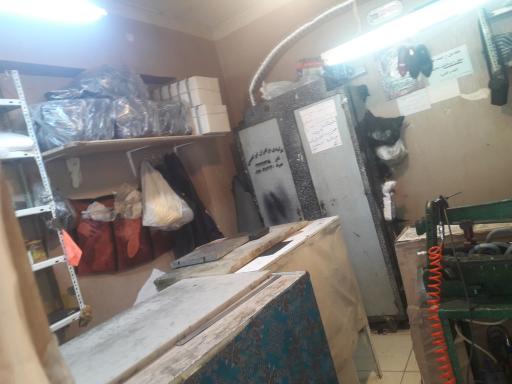 عکس تولید و تعمیرات کیف و کفش