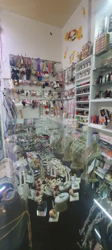 عکس فروشگاه لوازم ارایشی فتحی