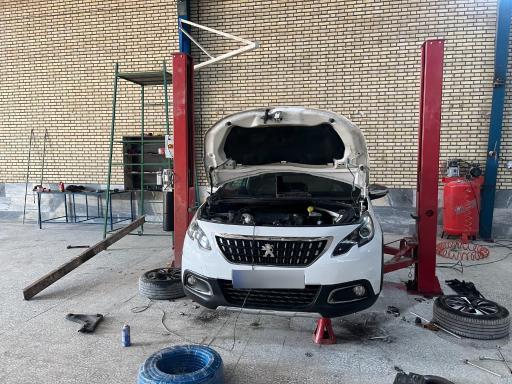 عکس تعمیرگاه و مکانیکی خودرو پرگاس