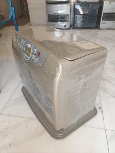 عکس تعمیرگاه بخاری نفتی وبرقی