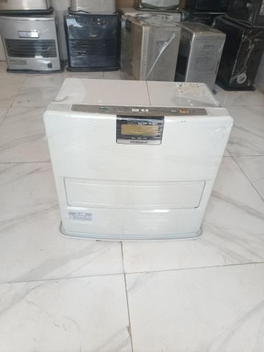 عکس تعمیرگاه بخاری نفتی وبرقی