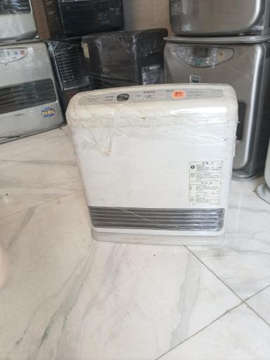 عکس تعمیرگاه بخاری نفتی وبرقی