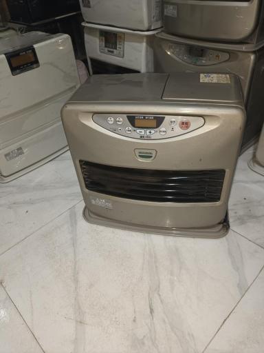 عکس تعمیرگاه بخاری نفتی وبرقی