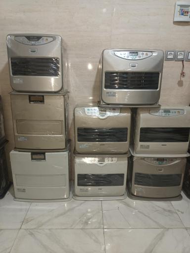 عکس تعمیرگاه بخاری نفتی وبرقی