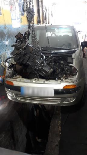 عکس تعمیرگاه تخصصی توسن