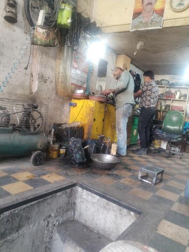 عکس تنظیم موتور و تعمیرگاه مکانیکی بهزاد