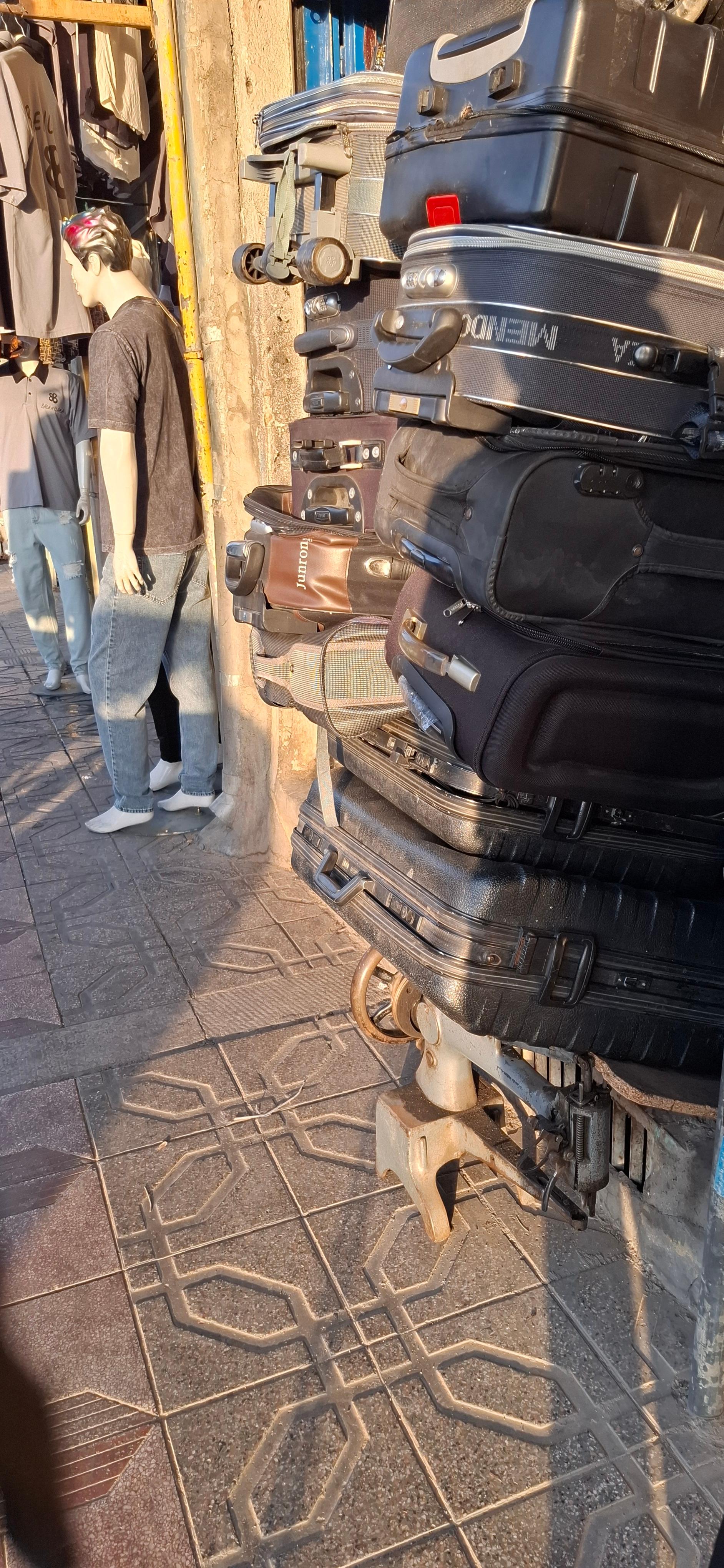 عکس کیف و چمدان دوزی