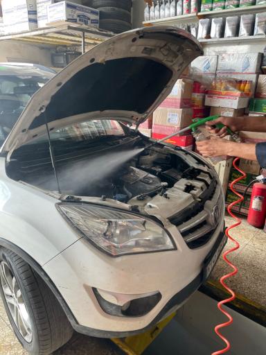 عکس تعویض روغن و کارواش رحیمی