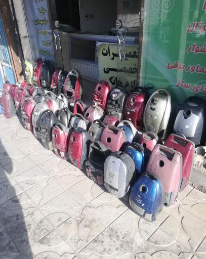 عکس تعمیرات لوازم خانگی آقای جارو برقی