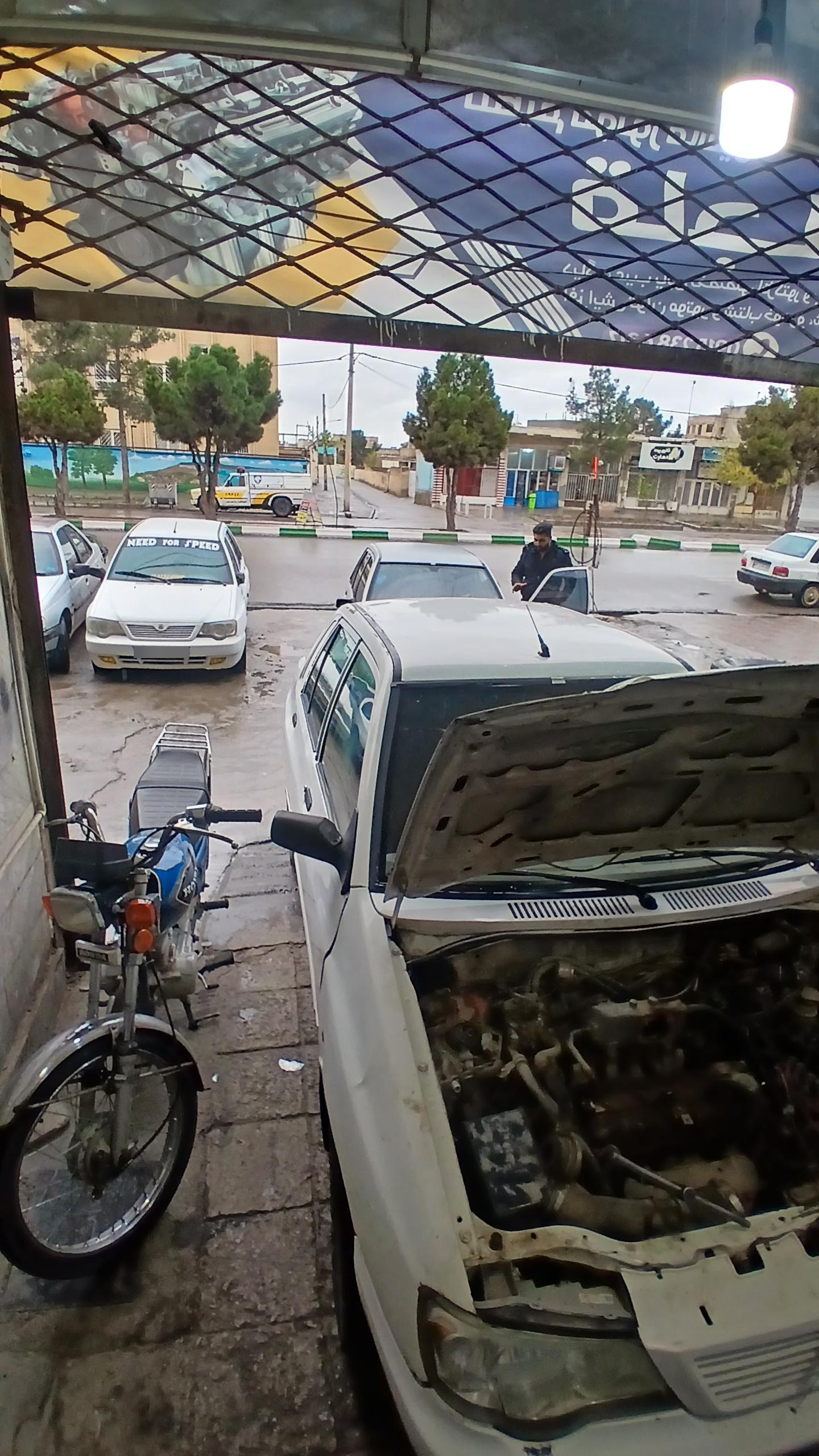 عکس چکاپ اتومبیل و تنظیم موتور قاجار