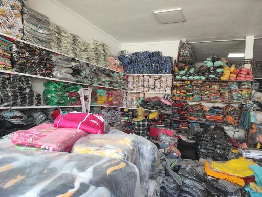 عکس تولید و پخش پوشاک کوشا