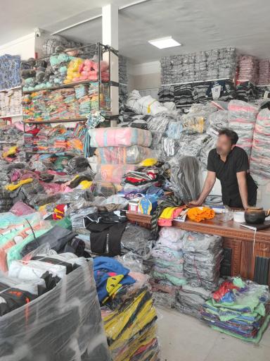 عکس تولید و پخش پوشاک کوشا