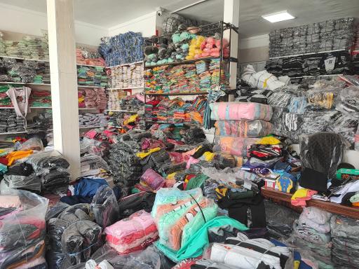 عکس تولید و پخش پوشاک کوشا