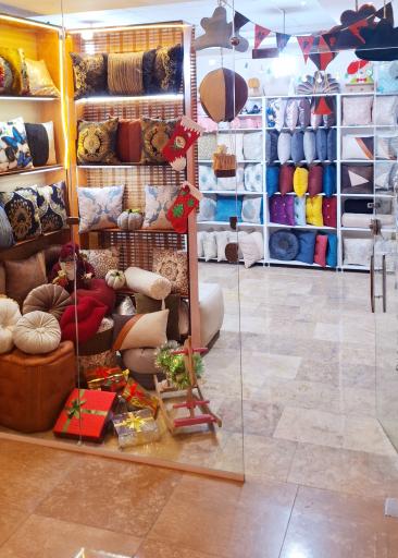 عکس فروشگاه کوسن وین