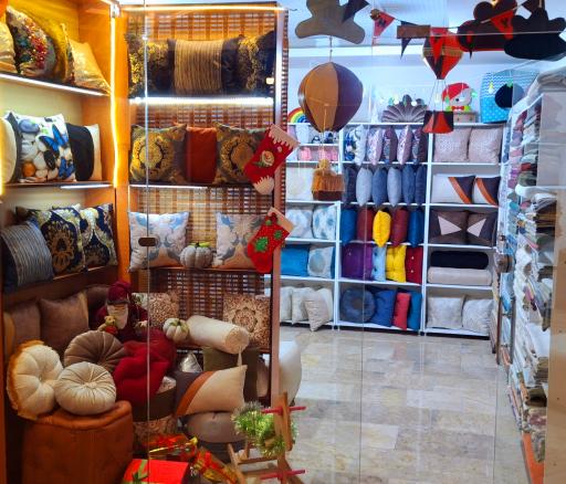 عکس فروشگاه کوسن وین