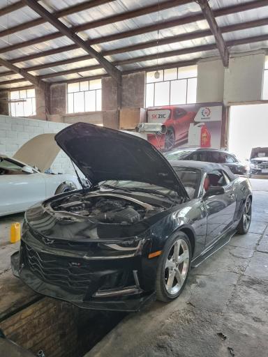 عکس تعمیرگاه بنز و بی ام و  بابایی