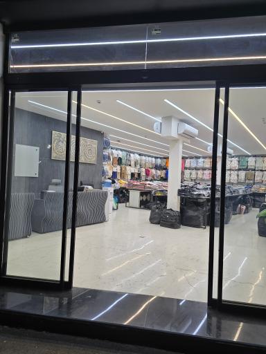 عکس پخش بزرگ پوشاک کودک نیکان