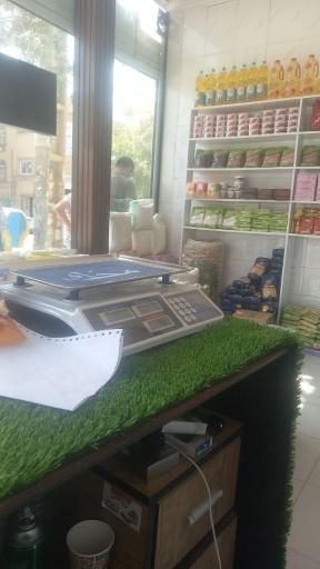 عکس عمده فروشی مواد غذایی امیر