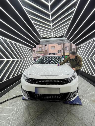 عکس کارشناسی و تشخیص رنگ و فنی خودرو تاج