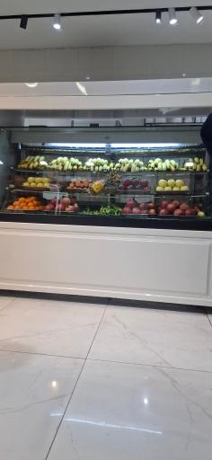 عکس بستنی فروشی کنارتخته