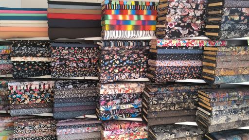 عکس پارچه فروشی نخکده