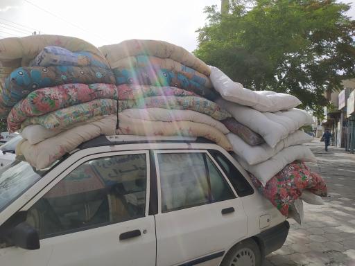 عکس لحافدوزی و پارچه سید