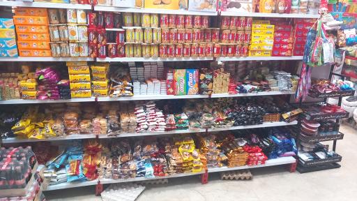 عکس سوپرمارکت دهکده مزه