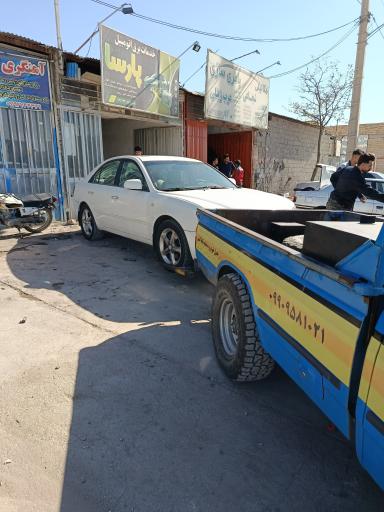 عکس تعمیرگاه و یدک کش فرازمند