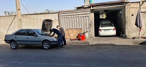 عکس مکانیکی حاج رسول و برادران