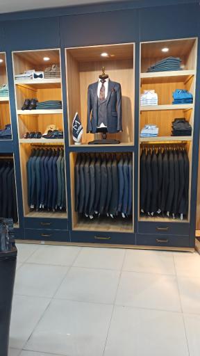 عکس فروشگاه کت شلوار دوما