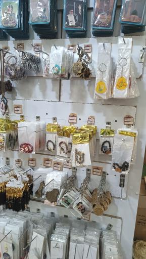 عکس فروشگاه عطرِ خدا