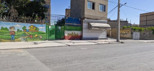 عکس دبستان شهید کوکبی و شادروان خدادادی