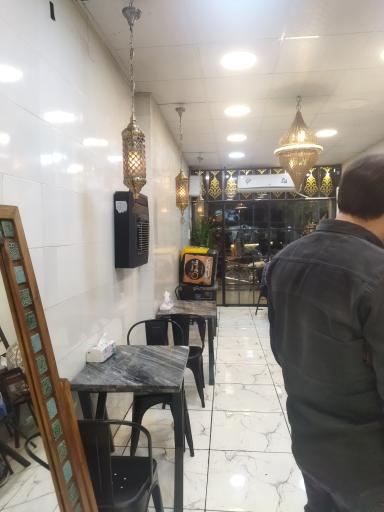 عکس باغ رستوران مرغ ذغالی طاووق