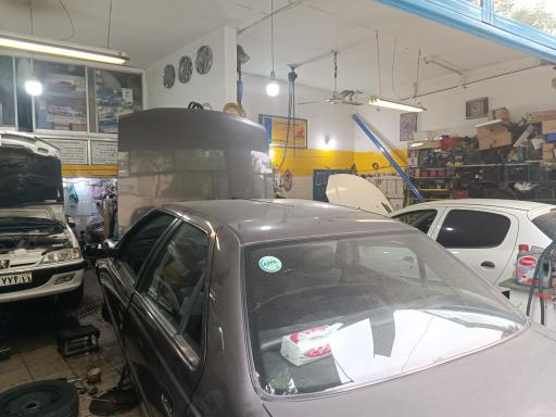 عکس تعمیرگاه پژو 2000