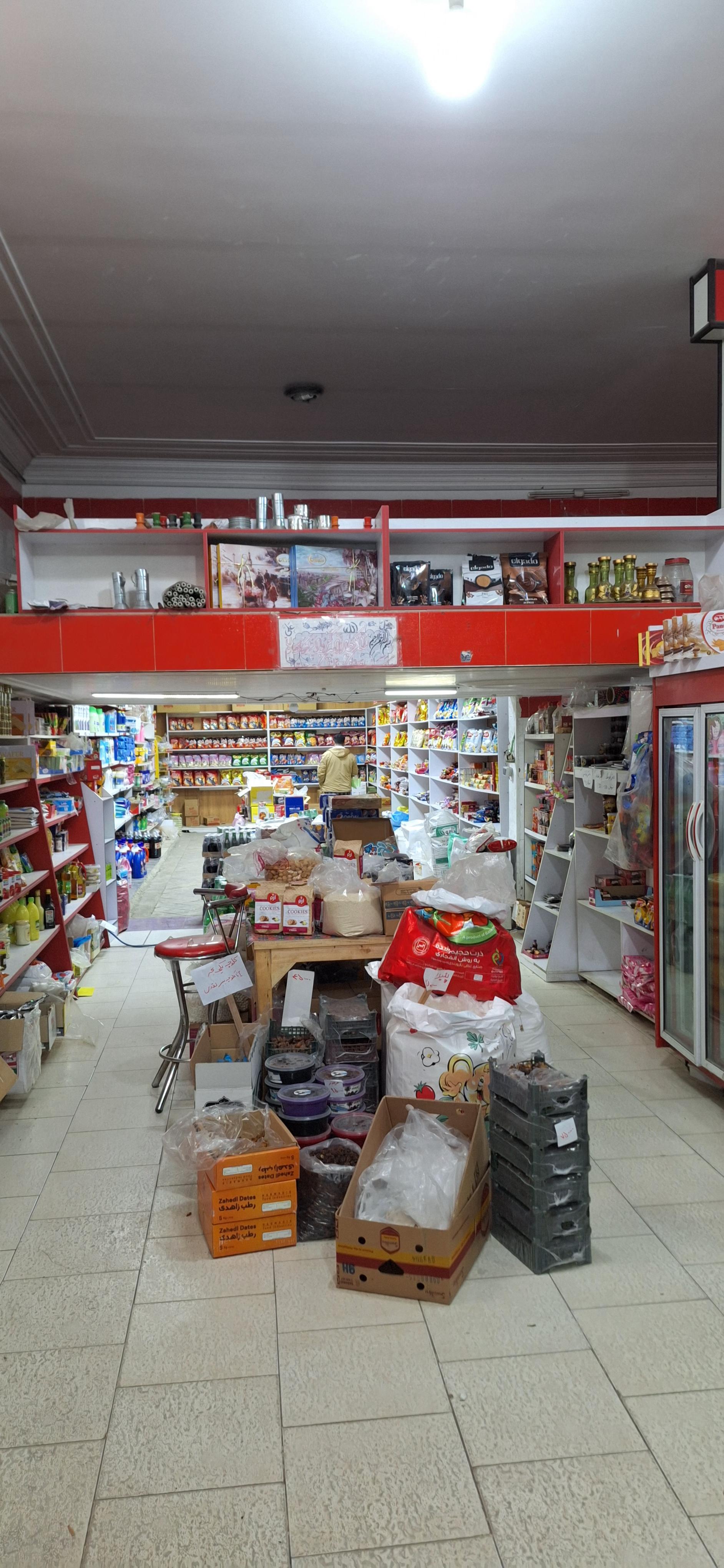 عکس سوپرمارکت بابا عزت الله