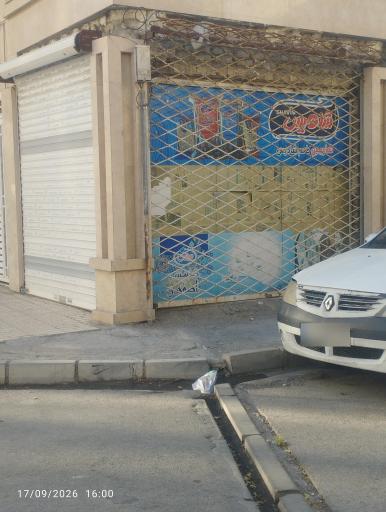 عکس سوپرمارکت حسن 