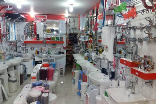 عکس فروشگاه بزرگ معلم