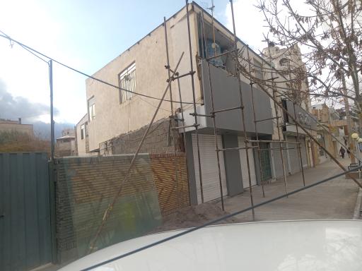 عکس مجتمع تجاری مسکونی معینی‌