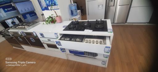 عکس فروشگاه اسنوا