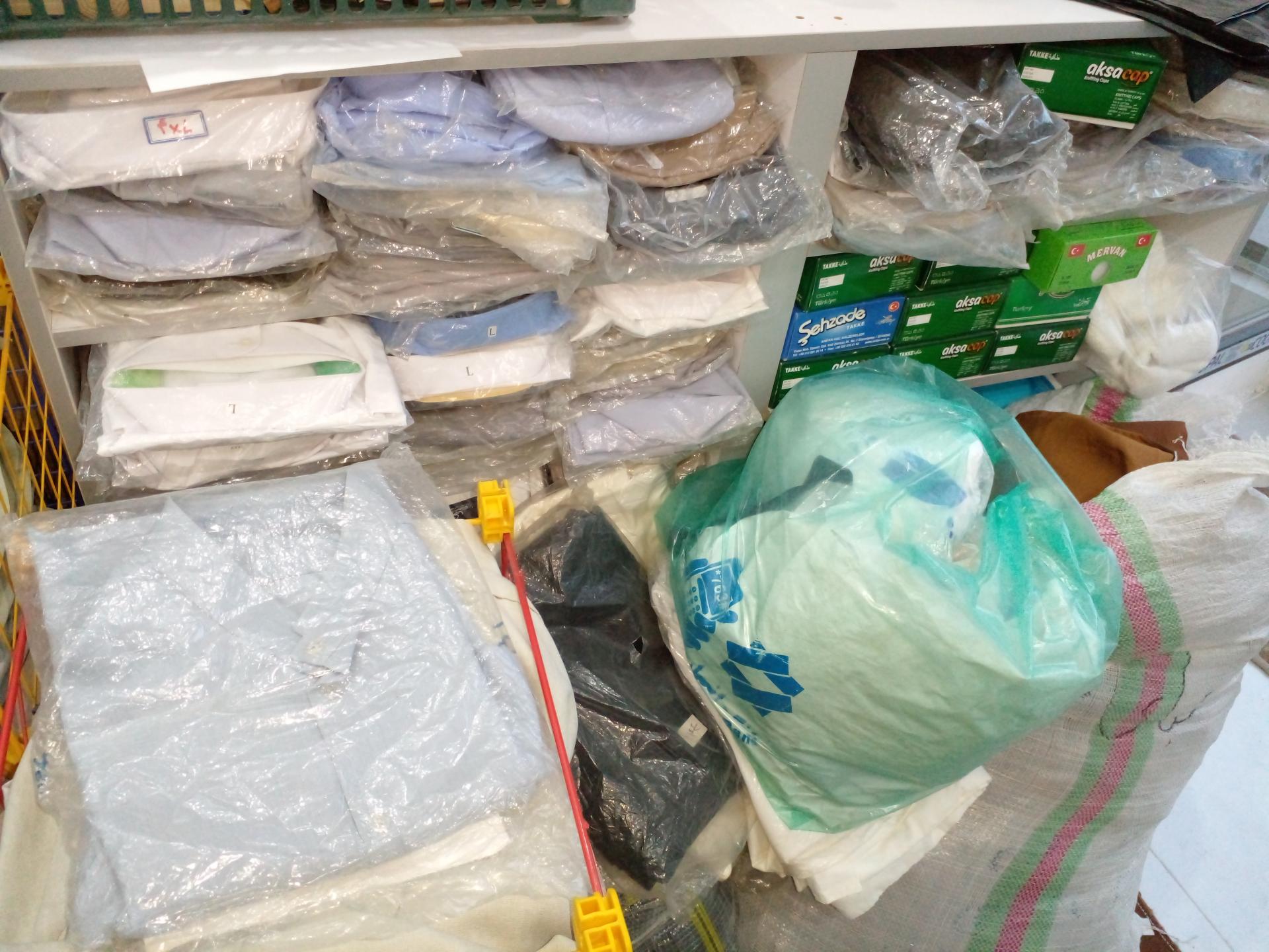 عکس فروشگاه لباس روحانیت چهار فصل